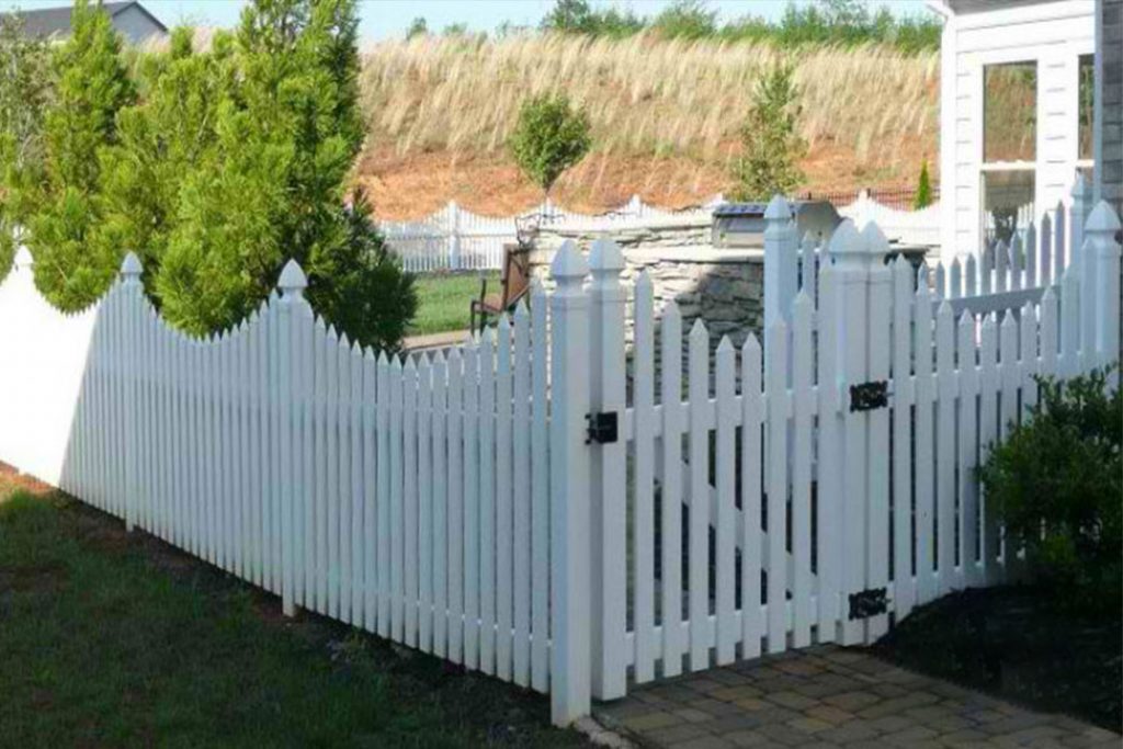 white vinyl scalloped picket fence